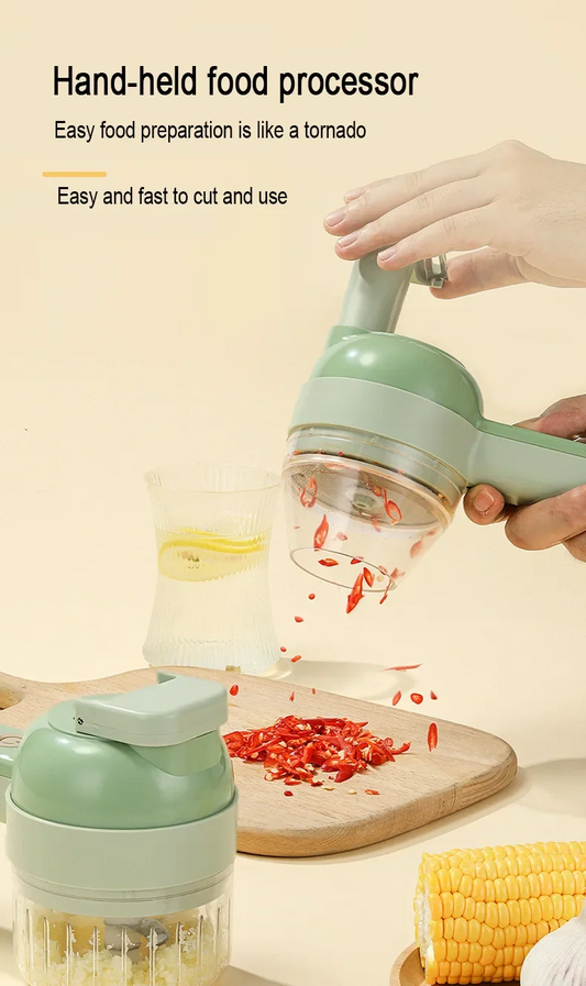 Hand-held food processor being used to chop vegetables on a wooden cutting board.