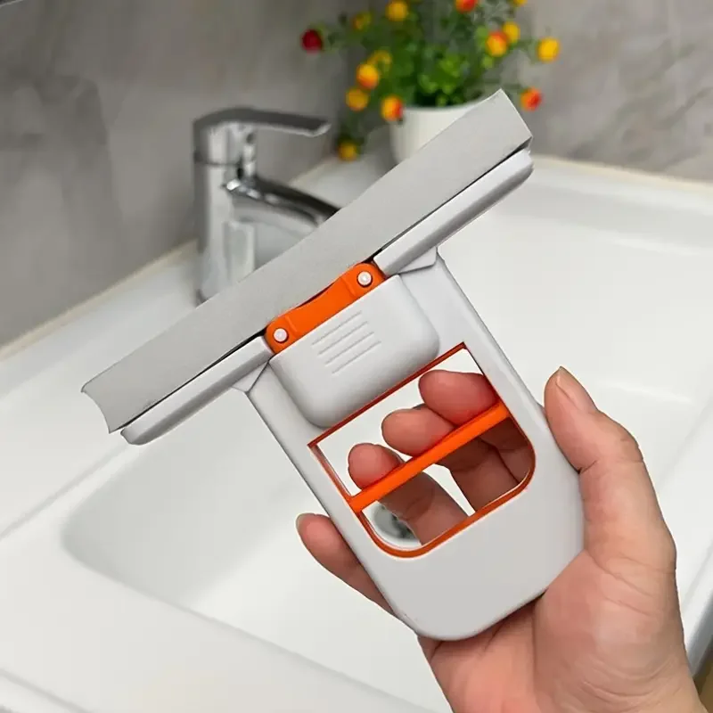 Close-up side view of the mop head showing flat squeegee edge and sturdy plastic frame.

