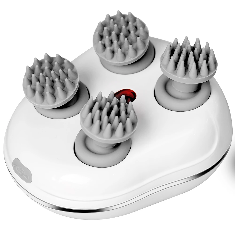 White grooming tool with four brush heads on a white background