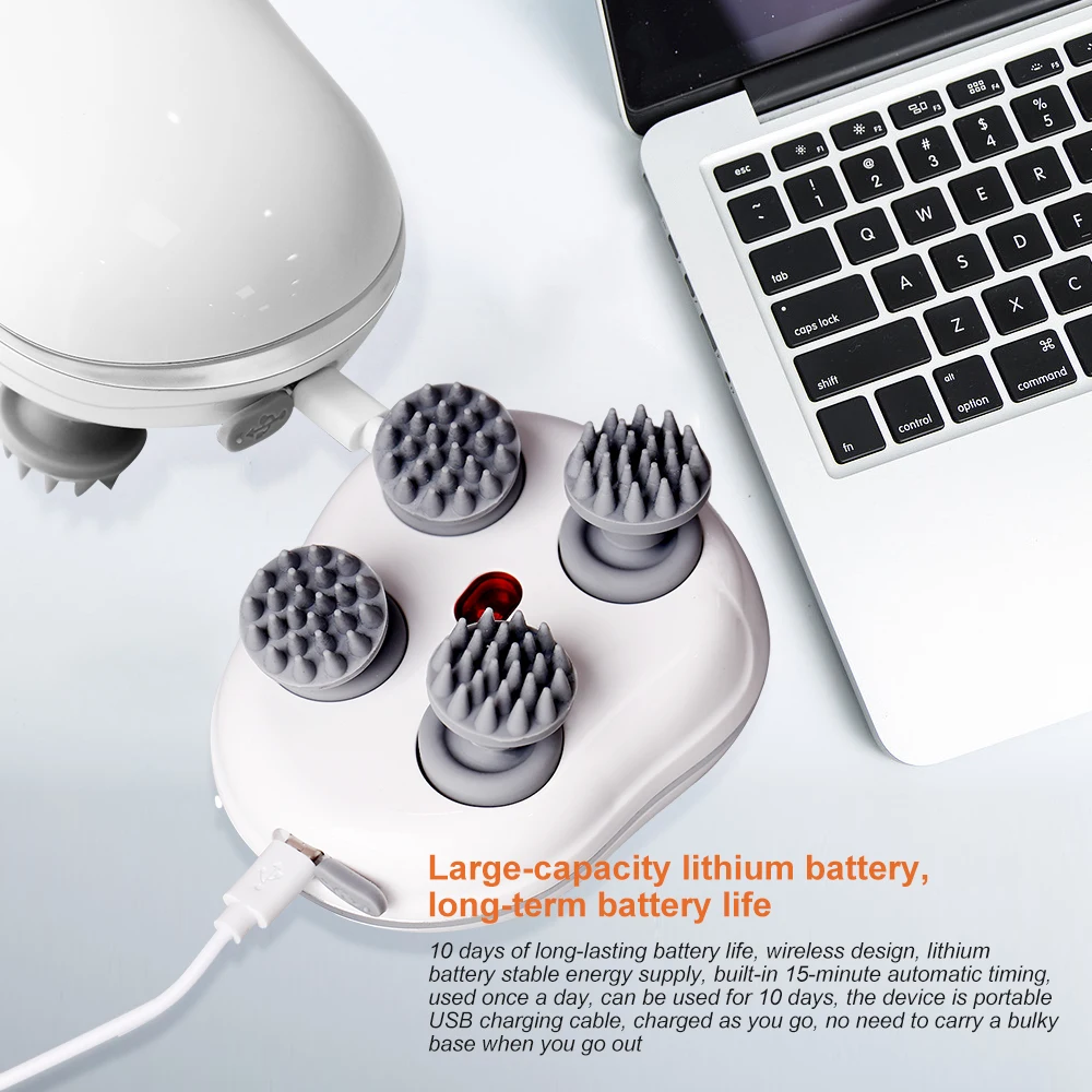 Portable device with multiple nozzles on a white surface next to a laptop.