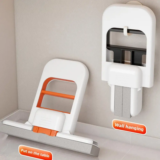 Compact multi-functional mini mop standing upright, white body with orange handle accents.

