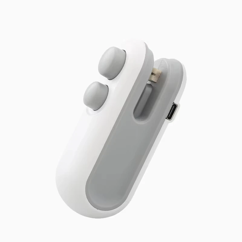 White and gray electronic packet sealer on a white background