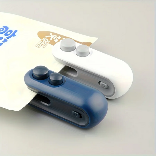 Two small electronic packet sealer , one blue and one white, on a light gray background.