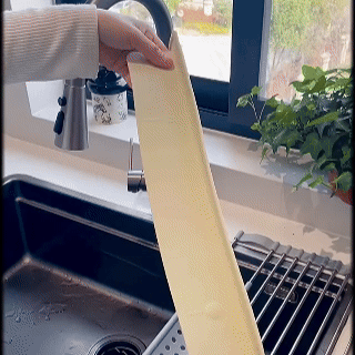 Step-by-step installation images for the silicone splash guard (wipe, peel, press, done).