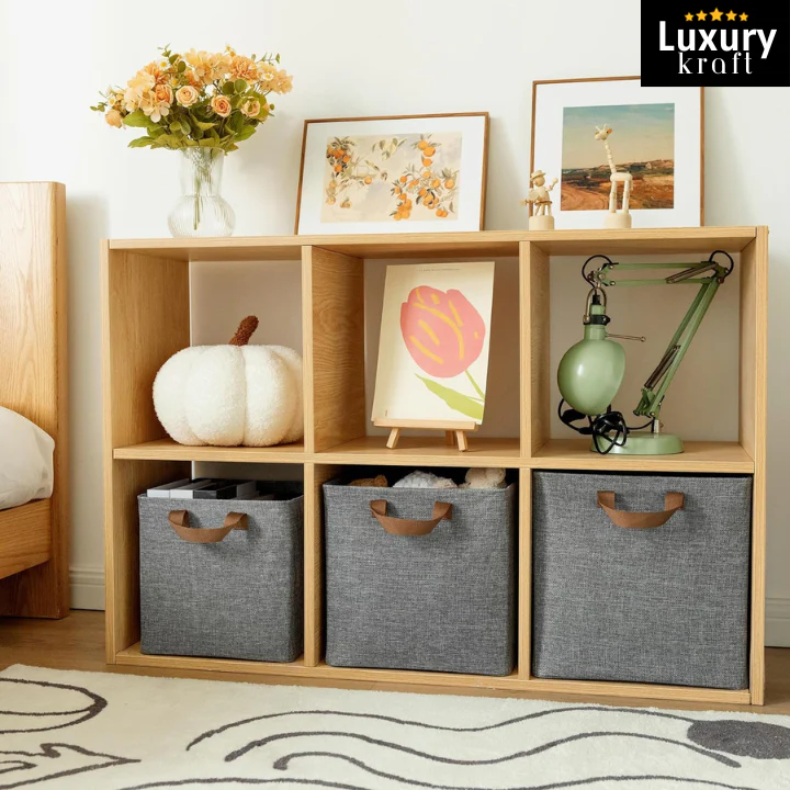 Wooden shelf with decorative items including a pumpkin, lamp, and storage bins in a room setting.